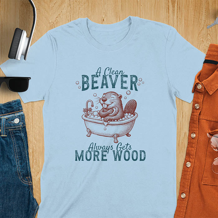 A t-shirt with a cartoon beaver in a bubble bath, holding a scrubber. Text: "A Clean Beaver Always Gets MORE WOOD". This adult humor shirt is a Dark humor shirt, Ironic tee-shirt & Funny meme shirt. A snarky humor designs & funny pun shirts, it's an unhinged meme tshirt for dirty funny adult laughs. An animal person gift, Dark humor tee, mom gift, gift for bff, or Offensive t shirts option.