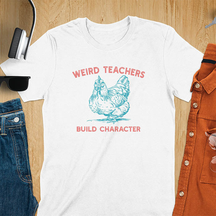 This teacher t-shirt features a grumpy-faced hen. The vintage font with distressed effect says Weird Teachers above the hen and Build Character below, all in a vintage color palette.
