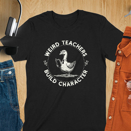 The design features a cartoon goose wearing glasses and holding a book. Surrounding the goose, there is text that reads, WEIRD TEACHERS BUILD CHARACTER.