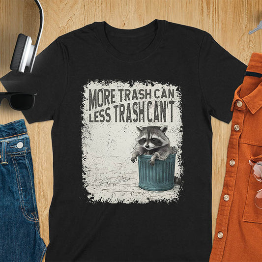 Raccoon lounging on a blue trash can with text "More Trash Can, Less Trash Can't." Distressed texture with vintage font. Perfect for animal lovers, sarcastic shirts, raccoon gifts, and fans of retro funny tees.