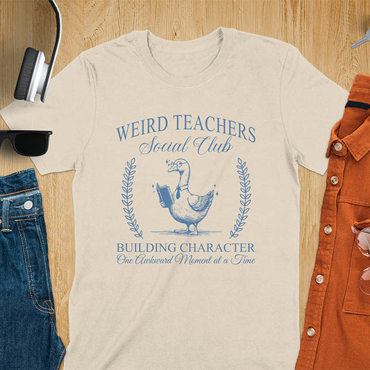A goose wearing glasses and holding a book, surrounded by text that reads Weird Teachers Social Club and Building Character One Awkward Moment at a Time.