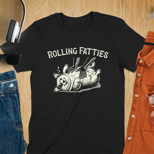 Quirky, trendy t-shirt with funny nostalgia and Y2K doggie pet vet vibes. Features a fat cute corgi and ROLLING FATTIES text. Perfect for corgi dad lovers and mom graphic owners. crewneck outfit with a retro aesthetic.