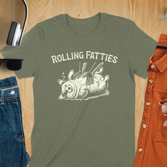 Quirky, trendy t-shirt with funny nostalgia and Y2K doggie pet vet vibes. Features a fat cute corgi and ROLLING FATTIES text. Perfect for corgi dad lovers and mom graphic owners. crewneck outfit with a retro aesthetic.