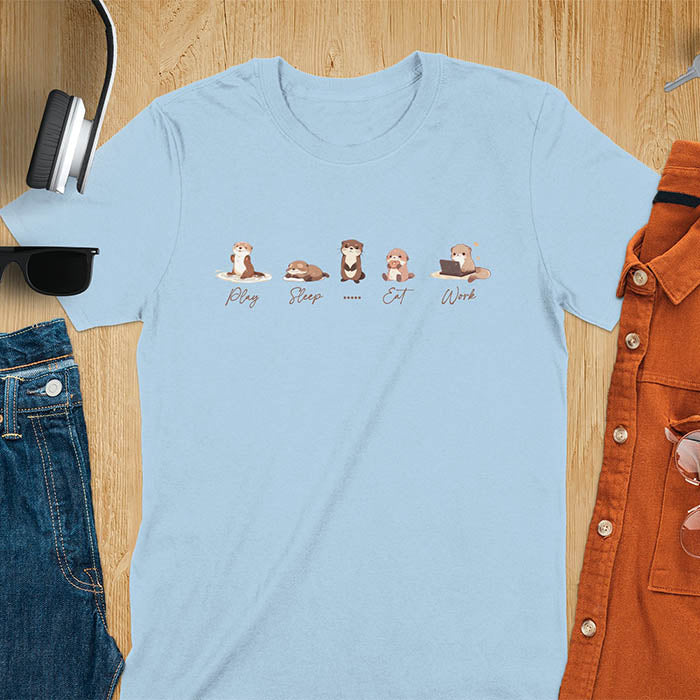 cute funny otters in a row side by side doing daily activities, play, sleep, eat, work, except for one which just stares blankly at you and a ..... is used to describe it. kawaii river otters tee-shirt