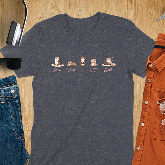 cute funny otters in a row side by side doing daily activities, play, sleep, eat, work, except for one which just stares blankly at you and a ..... is used to describe it. kawaii river otters tee-shirt