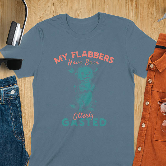A t-shirt with a startled-looking otter holding its paws in front of its chest. Sparkles surround the otter. Text: "MY FLABBERS" above and "HAVE BEEN Otterly GASTED" below. This weird silly funny tee shows Kawaiiness cuteness and Otter cuteness, a great Otter lover gift. A Sarcastic t-shirt and Funny gag gift, a Gen Z meme tee tapping into Weirdcore memes. An Animal person gift and Gift for mom, hers, one of the Shirts that go hard featuring a Cute sea otter.