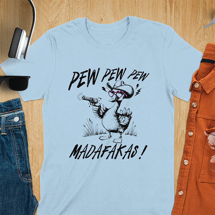 A t-shirt with a goose wearing a cowboy hat and sunglasses, holding a pistol. Text: "PEW PEW PEW" above and "MADAFAKAS!" below. This funny meme shirt features a silly funny goose with a sarcastic quote. A funny genz meme and sarcastic meme shirt, a snarky humorous funny adult joke. An animal person gift or goose lovers gift, a sassy quote funny funny fuck gift. A mom Gift alternative.