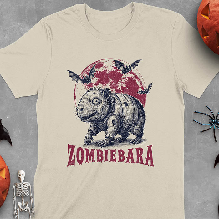 Sand color t-shirt Halloween zombie capybara featuring ZOMBIEBARA design with blood moon and bats