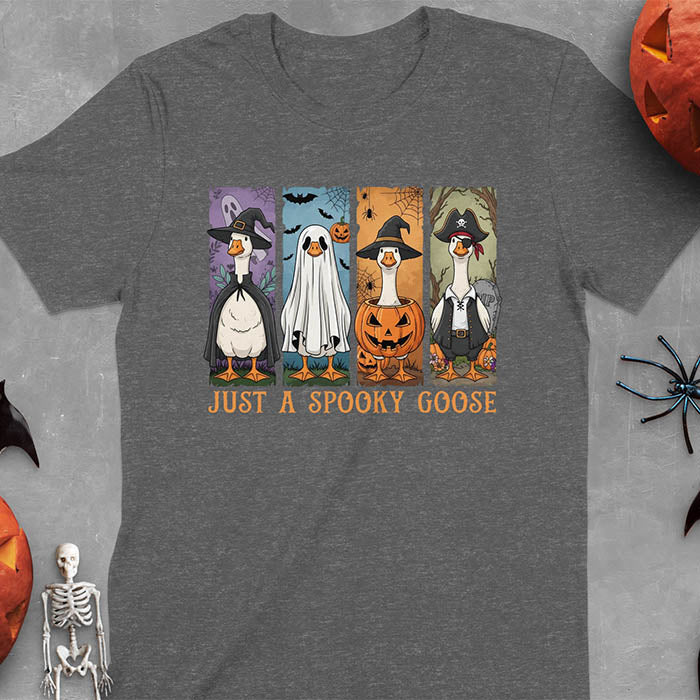Dark Heather Halloween Just a Spooky Goose t-shirt featuring ghost, pumpkin, witch, and pirate goose designs