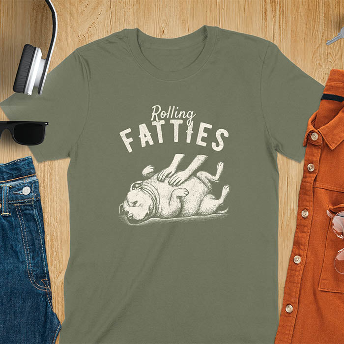 Military Green t-shirt with 'Rolling Fatties' text and illustration of chubby pitbull dog lying on its back with paws up, with human hands on the dog's belly