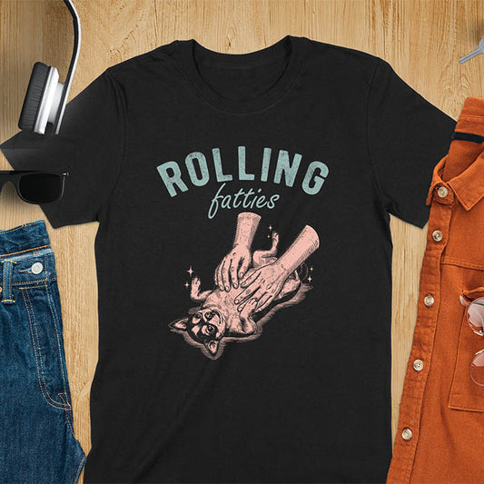 Black t-shirt featuring chubby chihuahua lying on back getting belly rubs from a pair of hands, text reads Rolling Fatties