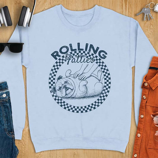 Light Blue sweatshirt with a badge-style graphic of a Bulldog rolled onto its back getting a two-handed belly rub, framed by a checkered ring and the text Rolling Fatties