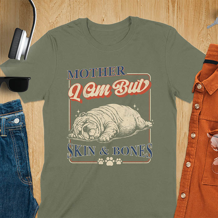 Mother I Am But Skin And Bones text with dramatic sprawled bulldog in pitiful starving pose with vintage retro frame graphic on military green t-shirt