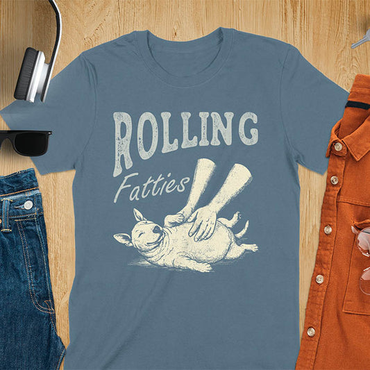 Indigo blue t-shirt with chubby Bull Terrier belly rub graphic featuring 'Rolling Fatties' text, funny dog meme design