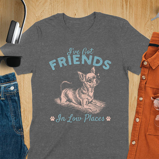 Dark heather t-shirt featuring a sitting chihuahua illustration with large ears and paw prints, text reads I've Got Friends In Low Places