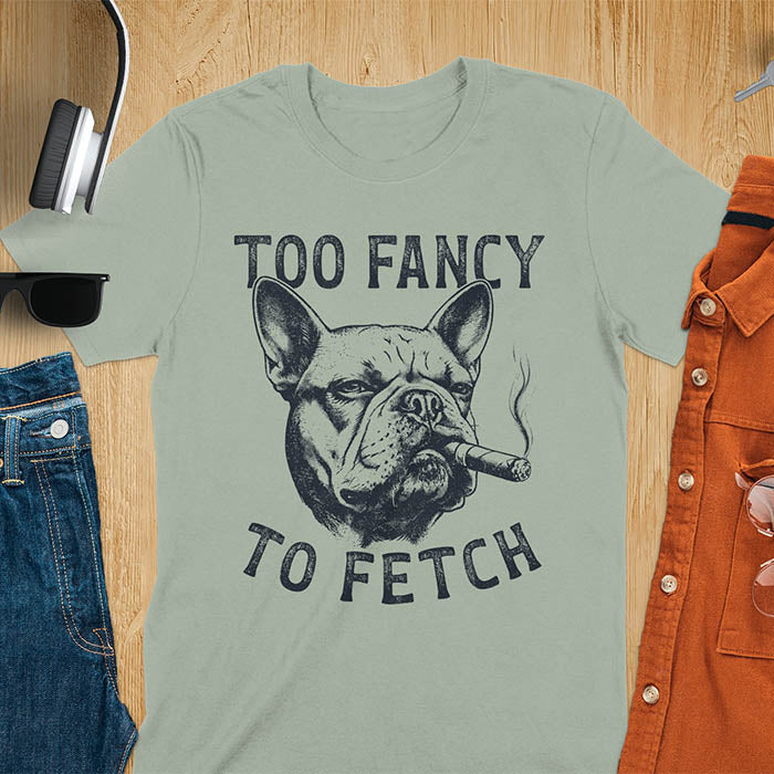 Sage green t-shirt with French Bulldog smoking cigar graphic featuring 'Too Fancy To Fetch' text - vintage grunge dog meme design
