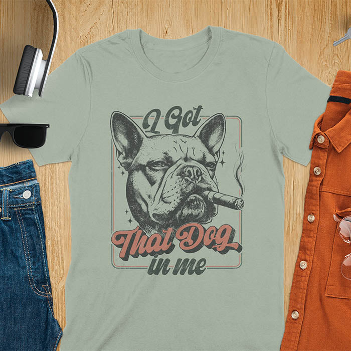 I Got That Dog In Me French Bulldog meme design with cigar smoking Frenchie in vintage retro frame graphic on sage green t-shirt