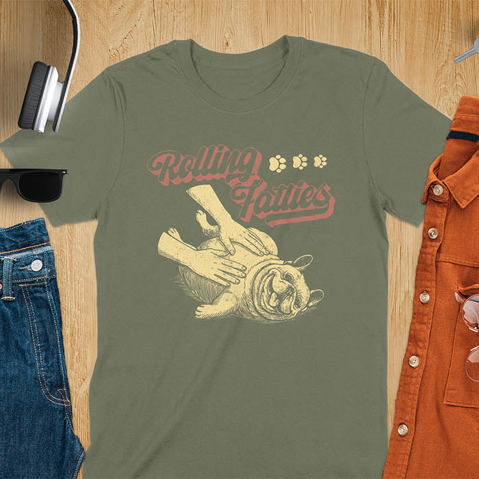 Military green t-shirt with Rolling Fatties script text and French Bulldog being petted by human hands in line drawing style.