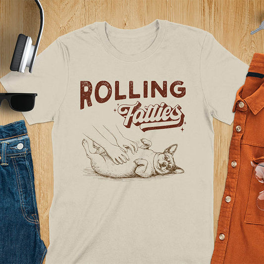 Rolling Fatties vintage text with illustration of chunky terrier lying on back getting belly rubs from human hands