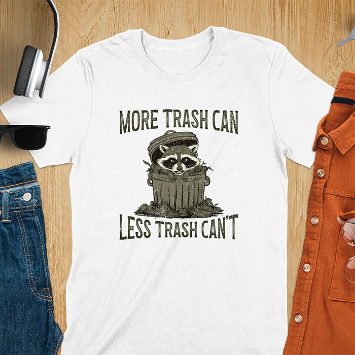 A fun and vintage retro T-Shirt featuring a funny raccoon with the phrase 'More trash can less trash can't'. This T-Shirt exudes a playful and lighthearted vibe, perfect for casual wear or lounging around.