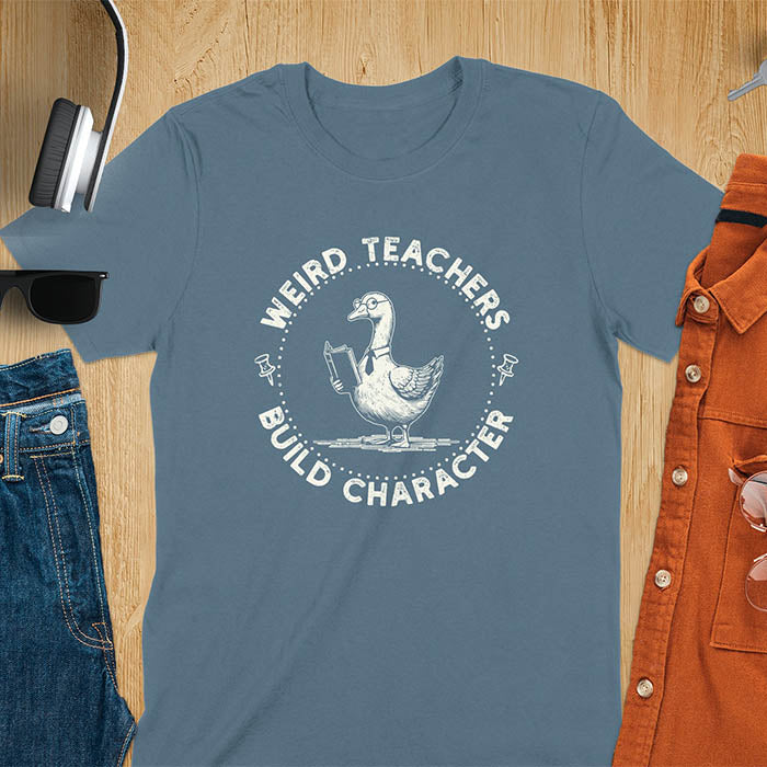 The design features a cartoon goose wearing glasses and holding a book. Surrounding the goose, there is text that reads, WEIRD TEACHERS BUILD CHARACTER.