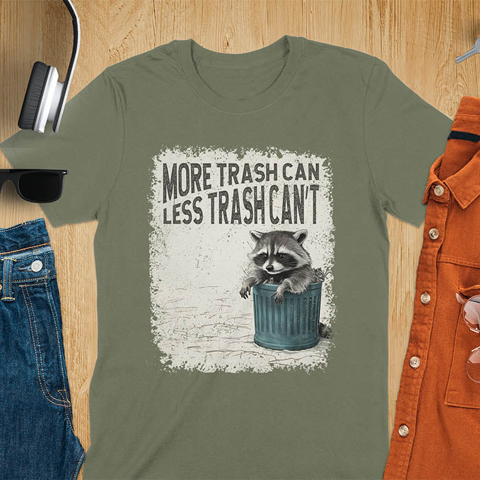 Raccoon lounging on a blue trash can with text "More Trash Can, Less Trash Can't." Distressed texture with vintage font. Perfect for animal lovers, sarcastic shirts, raccoon gifts, and fans of retro funny tees.