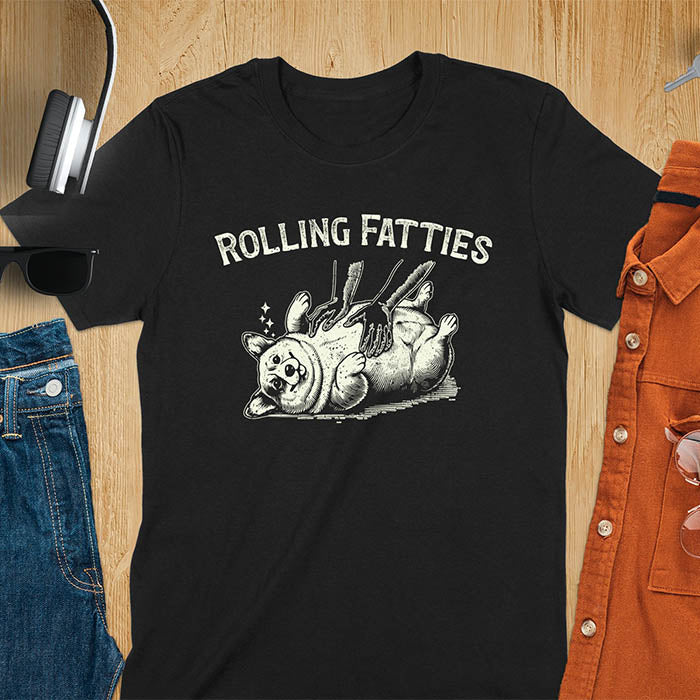 Quirky, trendy t-shirt with funny nostalgia and Y2K doggie pet vet vibes. Features a fat cute corgi and ROLLING FATTIES text. Perfect for corgi dad lovers and mom graphic owners. crewneck outfit with a retro aesthetic.