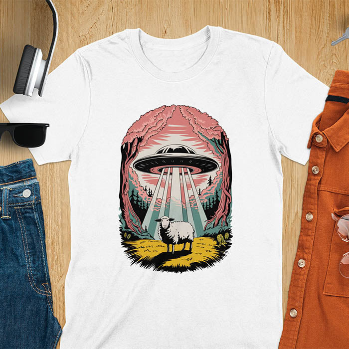 A t-shirt with a UFO hovering over a sheep in a forest scene. This alien tshirt depicts ufo alien abductions with a cute sheep. A weird shirt and funny alien gift, one of those oddly specific tees. A graphic tee-shirt with a 90s graphic tee style. A farm animal gifts or animal person gift. A farmer t shirt or farming shirt, a mom gift alternative.