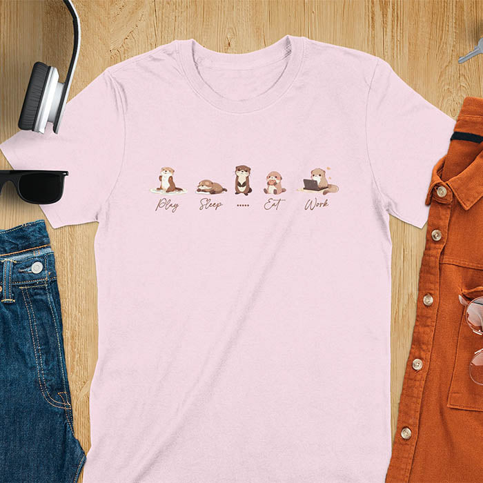 cute funny otters in a row side by side doing daily activities, play, sleep, eat, work, except for one which just stares blankly at you and a ..... is used to describe it. kawaii river otters tee-shirt