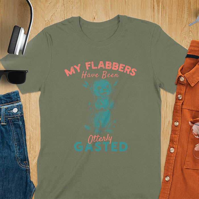 A t-shirt with a startled-looking otter holding its paws in front of its chest. Sparkles surround the otter. Text: "MY FLABBERS" above and "HAVE BEEN Otterly GASTED" below. This weird silly funny tee shows Kawaiiness cuteness and Otter cuteness, a great Otter lover gift. A Sarcastic t-shirt and Funny gag gift, a Gen Z meme tee tapping into Weirdcore memes. An Animal person gift and Gift for mom, hers, one of the Shirts that go hard featuring a Cute sea otter.