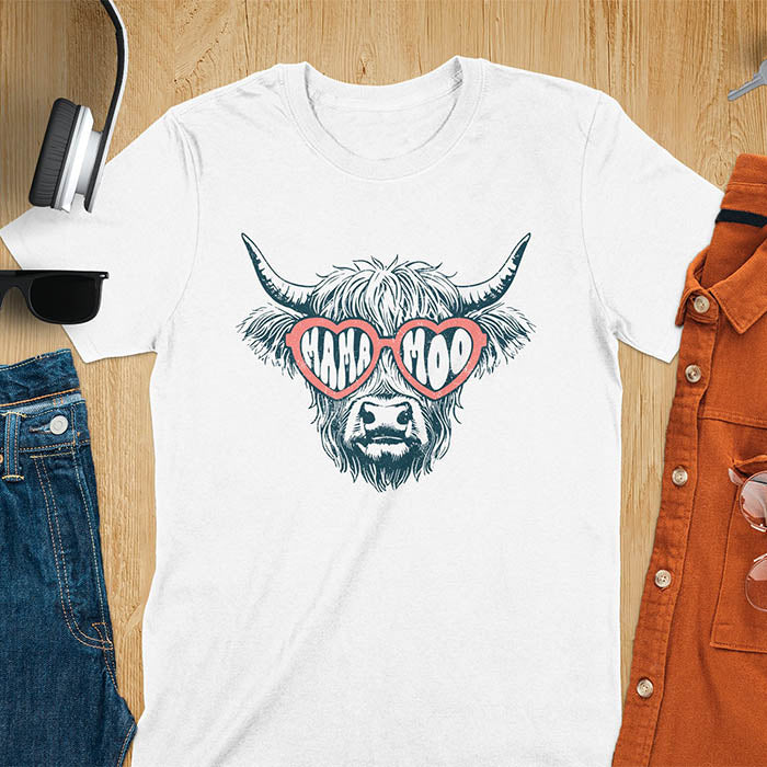 A t-shirt featuring a fluffy highland cow face with long horns, wearing pink heart-shaped sunglasses spelling MAMA MOO. Below the cow, Veronica is written in script font. This retro mom tee-shirt design is a cute cow highlander for mama mom life. A funny animal mom tee for an expecting mom or pregnant mom gift, ideal for a pregnancy announcement or pregnancy reveal. A great mom gift or Mother days gift, or a new mom gift for a gift for wife. The name can be personalized.