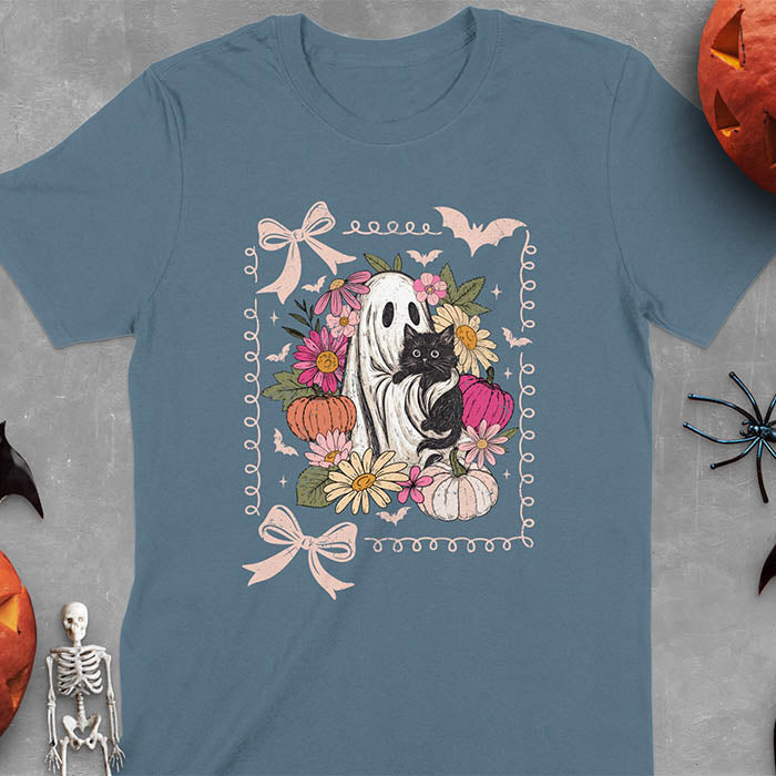 Indigo Blue t-shirt featuring cute ghost holding black cat surrounded by pumpkins, bats, and floral elements in cottagecore coquette style