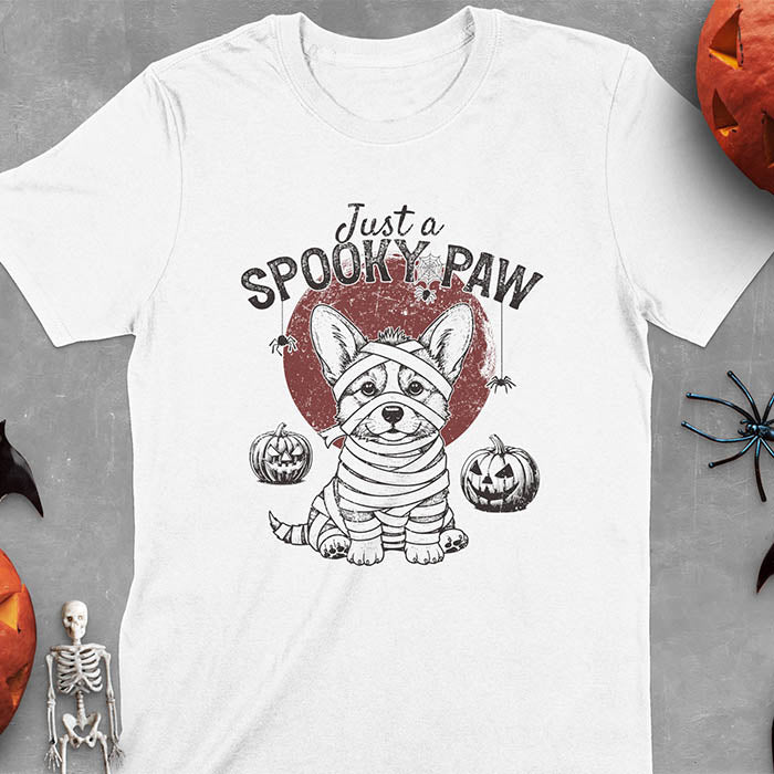 White t-shirt with Halloween mummy corgi featuring "Just a Spooky Paw" text and wrapped corgi graphics