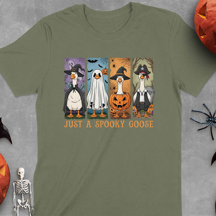 Military green Halloween Just a Spooky Goose t-shirt featuring ghost, pumpkin, witch, and pirate goose designs