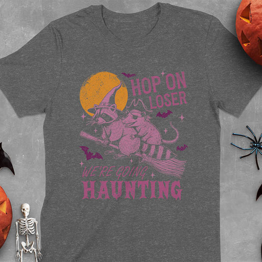 Dark heather Halloween witch raccoon and opossum t-shirt with flying broom animal graphics
