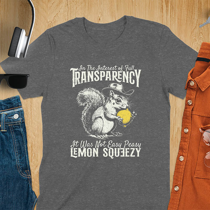 Dark heather t-shirt featuring illustrated squirrel wearing cowboy hat and holding yellow lemon with text 'In The Interest of Full Transparency It Was Not Easy Peasy Lemon Squeezy' - funny sarcastic meme design