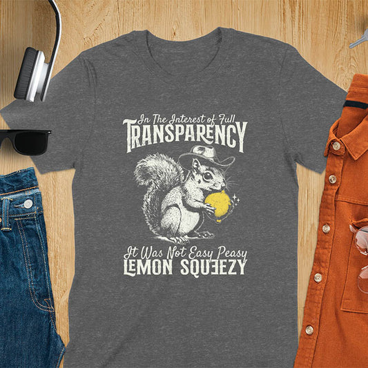Dark heather t-shirt featuring illustrated squirrel wearing cowboy hat and holding yellow lemon with text 'In The Interest of Full Transparency It Was Not Easy Peasy Lemon Squeezy' - funny sarcastic meme design