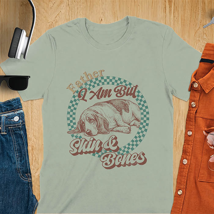Sage green shirt with Basset Hound graphic, retro checkered design and "Father I Am But Skin And Bones" text