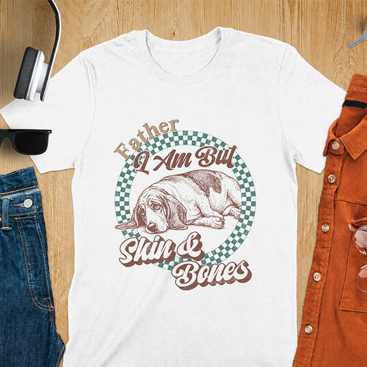 White shirt with Basset Hound graphic, retro checkered design and "Father I Am But Skin And Bones" text