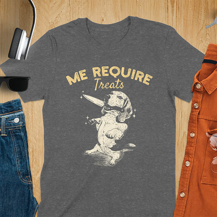 Dark Heather t-shirt with Me Require Treats text, basset hound meme design, and vintage grumpy dog biting on a knife in its mouth illustration
