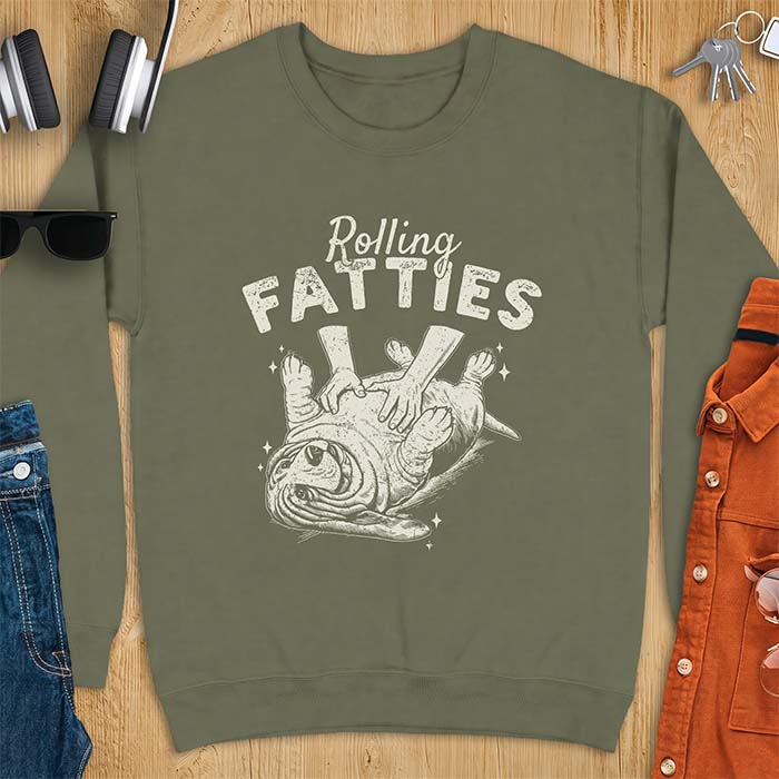Military Green sweatshirt with a graphic of a basset hound lying on its back while a pair of hands knead its rolled up folds like dough and the text Rolling Fatties