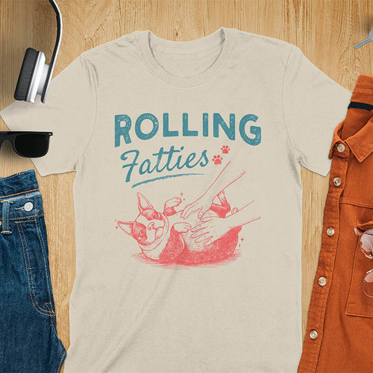 Sand color tee with vintage "Rolling Fatties" text and Boston Terrier rolling on back getting belly rubs graphic