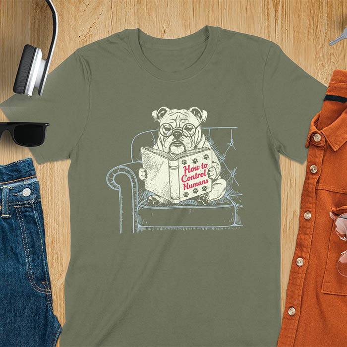 Military Green t-shirt with vintage bulldog illustration reading 'How to Control Human' book on couch - retro graphic design with humor 