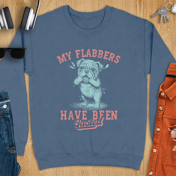 Indigo Blue sweatshirt with a graphic of an English Bulldog puppy covering its face in shock, lightning bolts crackling by its ears, printed with the text My Flabbers Have Been Gasted.