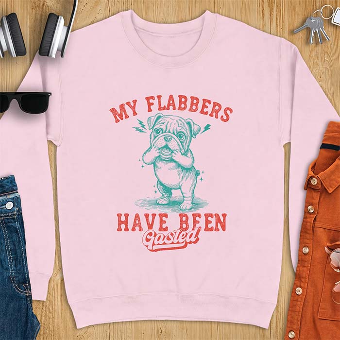Light Pink sweatshirt with a graphic of an English Bulldog puppy covering its face in shock, lightning bolts crackling by its ears, printed with the text My Flabbers Have Been Gasted.