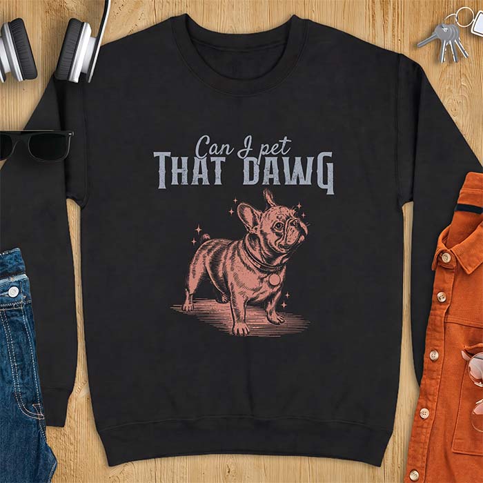 Black sweatshirt with a graphic of a French Bulldog standing and looking up with sparkles around it and the text Can I Pet That Dawg