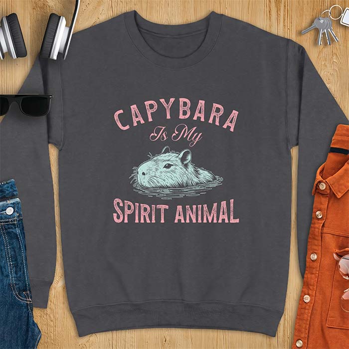 Dark Heather sweatshirt with a graphic of a capybara relaxing in water and the text Capybara Is My Spirit Animal