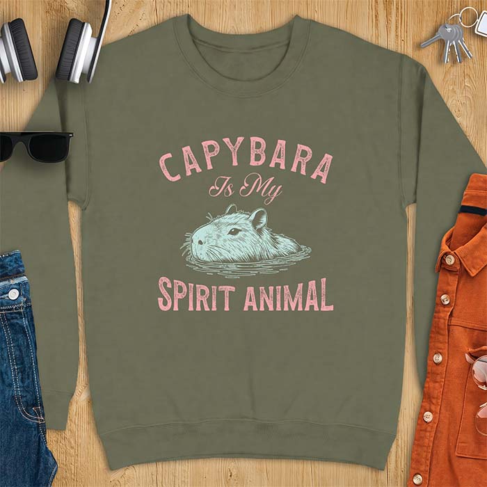 Military Green sweatshirt with a graphic of a capybara relaxing in water and the text Capybara Is My Spirit Animal