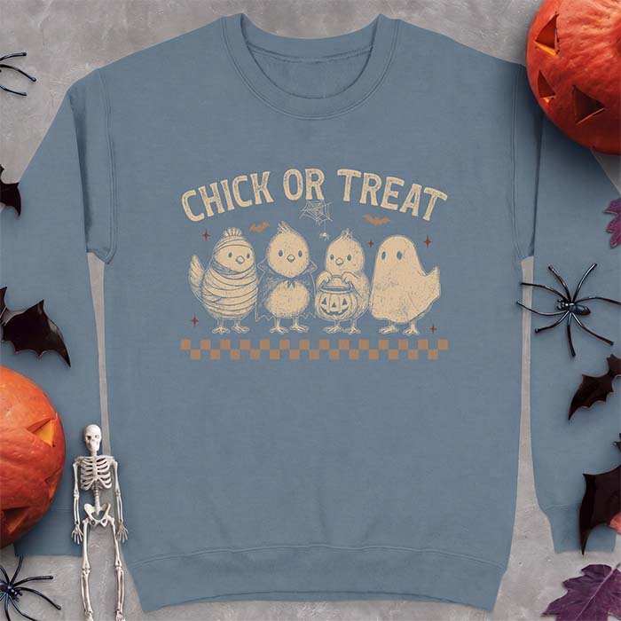 Indigo Blue sweatshirt with a Halloween graphic of four baby chicks dressed as a mummy, a vampire, a pumpkin bucket trick-or-treater and a ghost, with the text Chick Or Treat