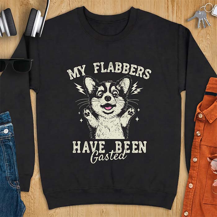 Black sweatshirt with a corgi illustration, paws raised in shock, mouth open in a gasp, lightning bolts beside its ears, and the text My Flabbers Have Been Gasted